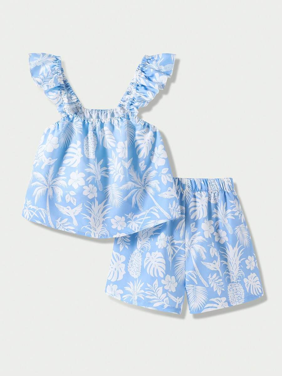 Tween girl wearing a blue and white striped sleeveless top featuring embroidery details and ruffle trim with matching shorts.