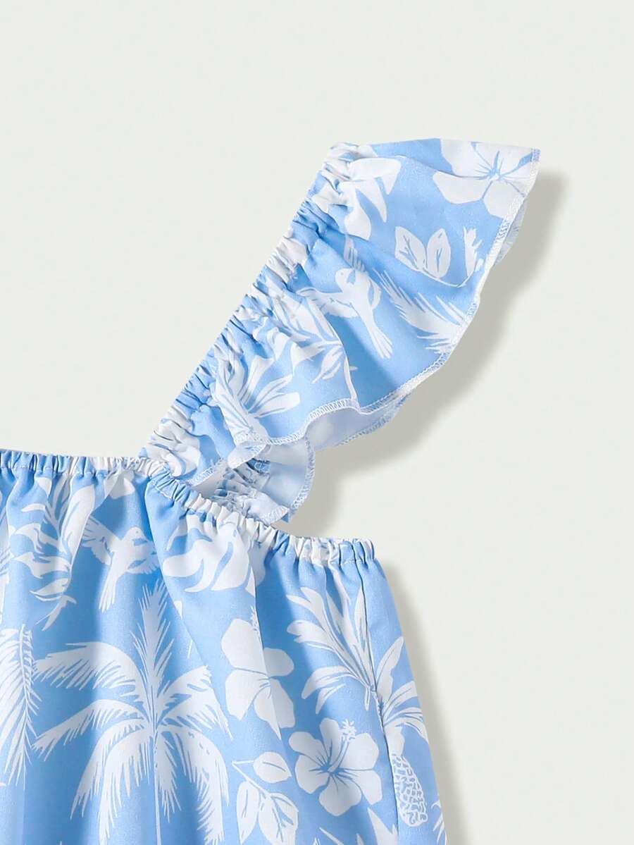 Tween girl wearing a blue and white striped sleeveless top featuring embroidery details and ruffle trim with matching shorts.