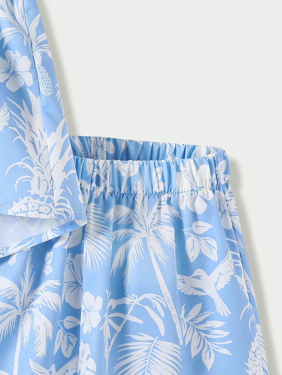 Tween girl wearing a blue and white striped sleeveless top featuring embroidery details and ruffle trim with matching shorts.