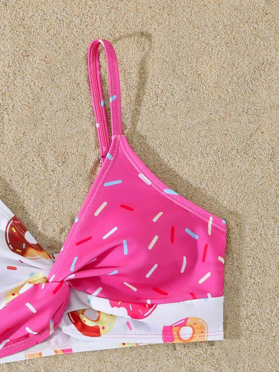 Tween girls multicolor striped 2-piece bikini set with spaghetti strap top, twist detail, and short high-waist or mid-waist swim bottoms for beach and pool wear.