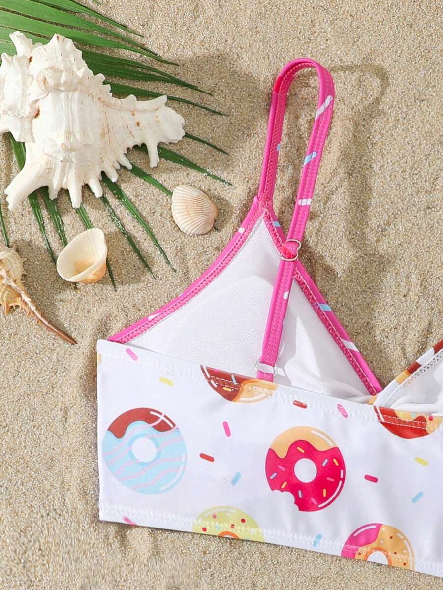 Tween girls multicolor striped 2-piece bikini set with spaghetti strap top, twist detail, and short high-waist or mid-waist swim bottoms for beach and pool wear.
