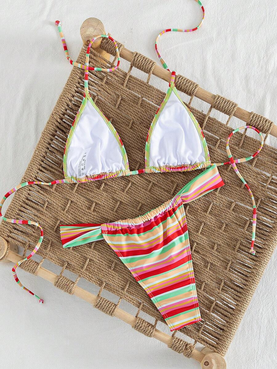 Women's striped halter two-piece swimsuit featuring a lace-up triangle top with removable padding and high-cut low-waist bikini bottoms.
