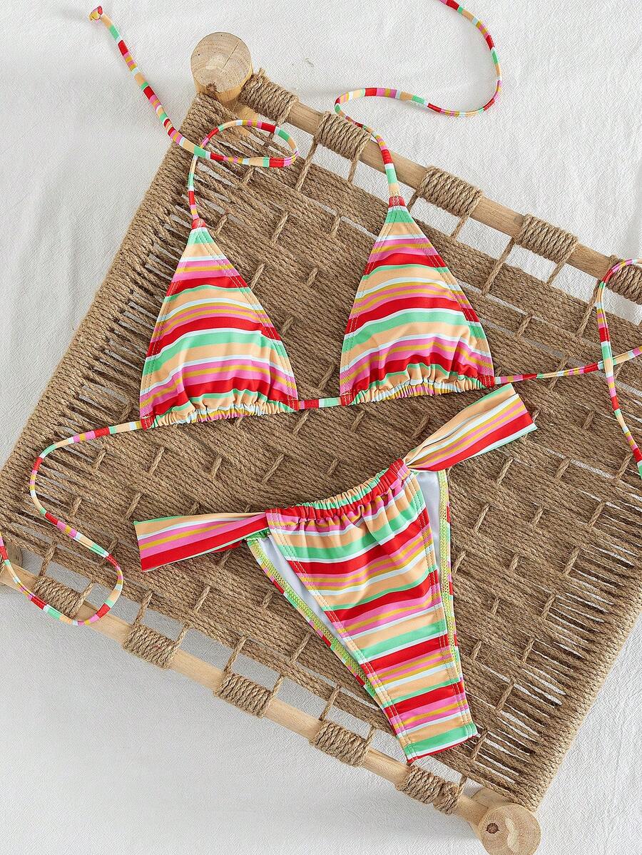 Women's striped halter two-piece swimsuit featuring a lace-up triangle top with removable padding and high-cut low-waist bikini bottoms.