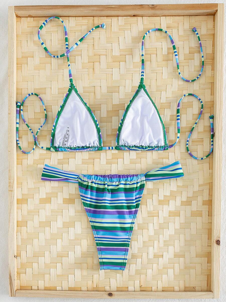 Women's striped halter two-piece swimsuit featuring a lace-up triangle top with removable padding and high-cut low-waist bikini bottoms.