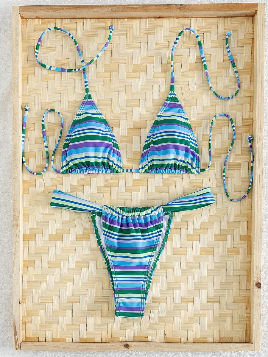 Women's striped halter two-piece swimsuit featuring a lace-up triangle top with removable padding and high-cut low-waist bikini bottoms.