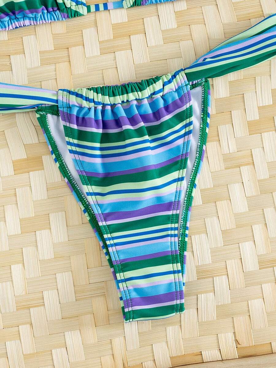 Women's striped halter two-piece swimsuit featuring a lace-up triangle top with removable padding and high-cut low-waist bikini bottoms.