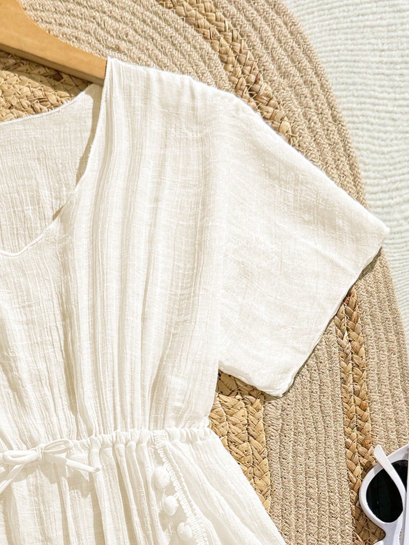 White tween girls swimsuit cover-up with V neck, short sleeves, contrast lace, fringe details, and regular length mesh fabric for beachwear