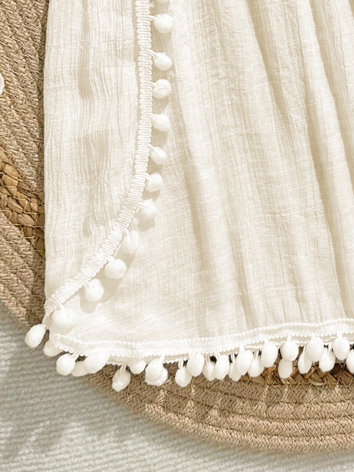White tween girls swimsuit cover-up with V neck, short sleeves, contrast lace, fringe details, and regular length mesh fabric for beachwear