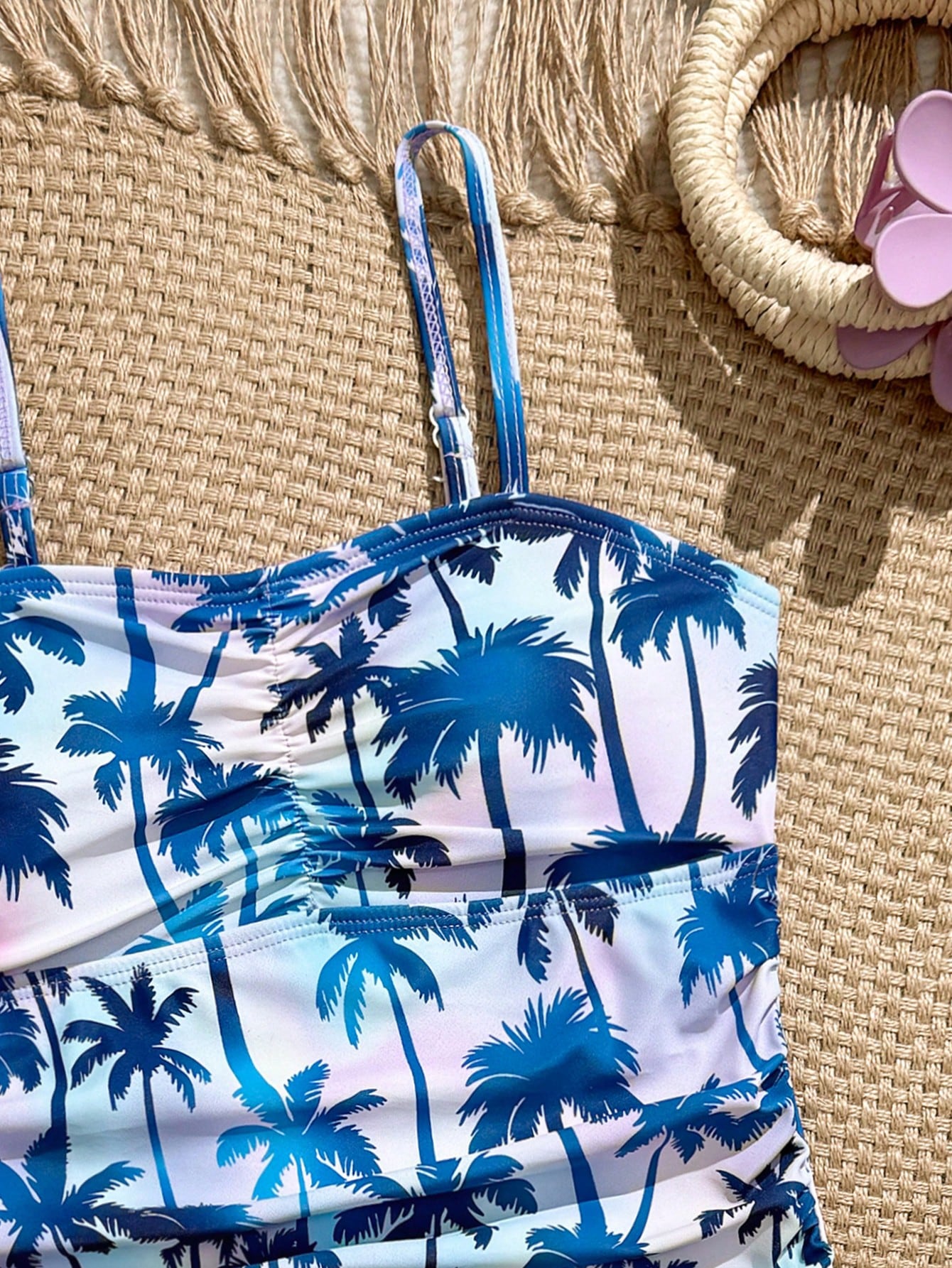 Tween girls 2-piece bikini swimwear set in black with a wave-pattern geometric design, featuring halter neckline, wireless top, and high-waist short bottoms with starfish and shell decor.