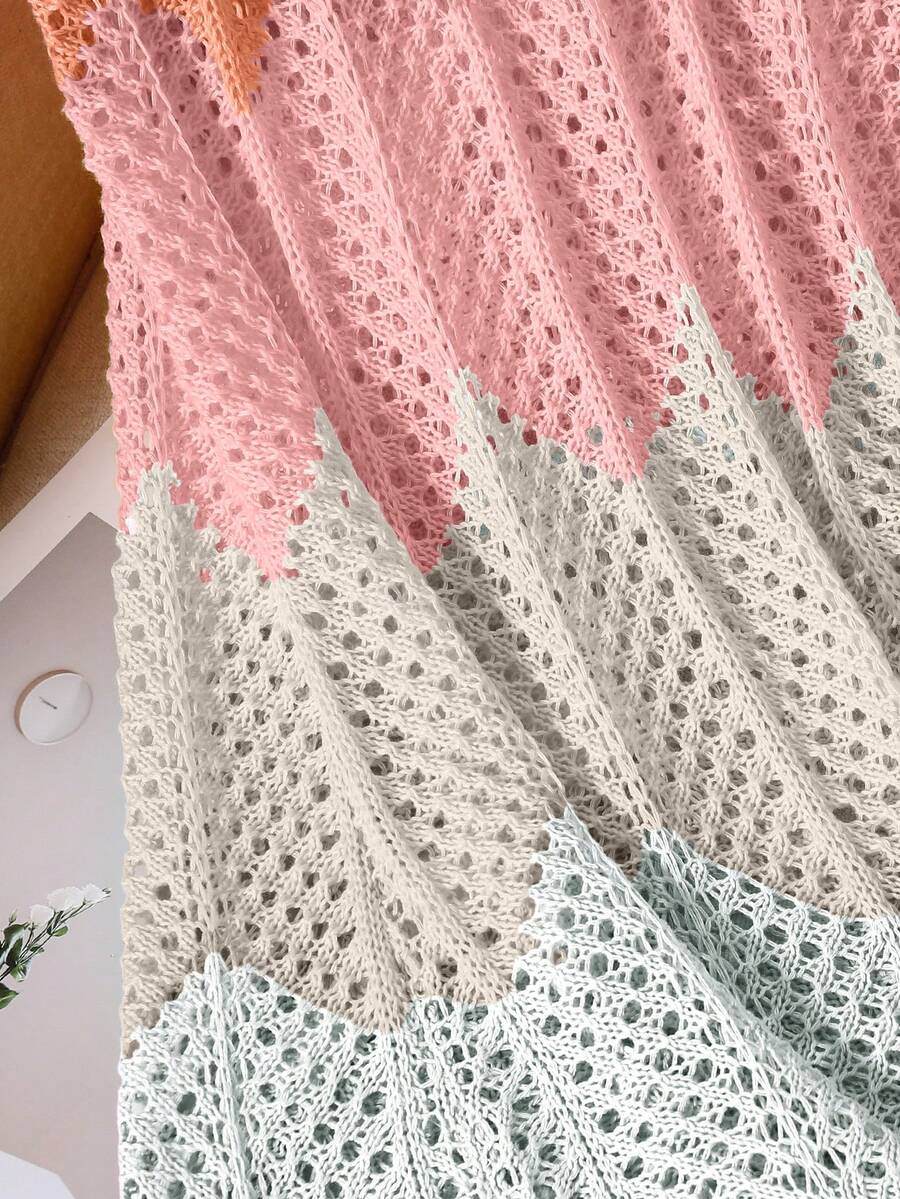 Girls' multicolor rainbow gradient crochet beach cover up with hollow-out knit design, spaghetti straps, sleeveless A-line shape, and semi-sheer finish.