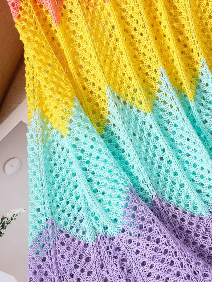 Girls' multicolor rainbow gradient crochet beach cover up with hollow-out knit design, spaghetti straps, sleeveless A-line shape, and semi-sheer finish.