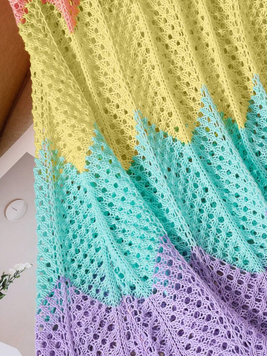 Girls' multicolor rainbow gradient crochet beach cover up with hollow-out knit design, spaghetti straps, sleeveless A-line shape, and semi-sheer finish.