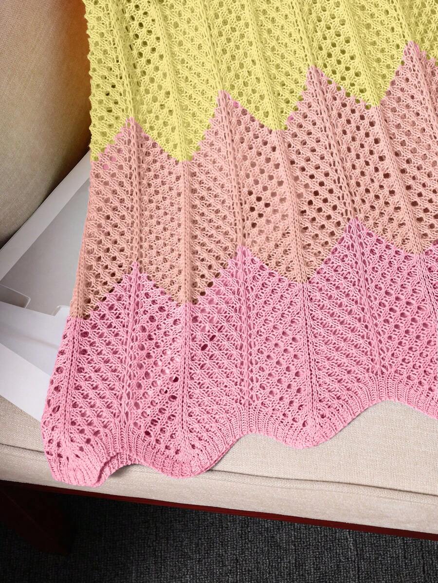 Girls' multicolor rainbow gradient crochet beach cover up with hollow-out knit design, spaghetti straps, sleeveless A-line shape, and semi-sheer finish.