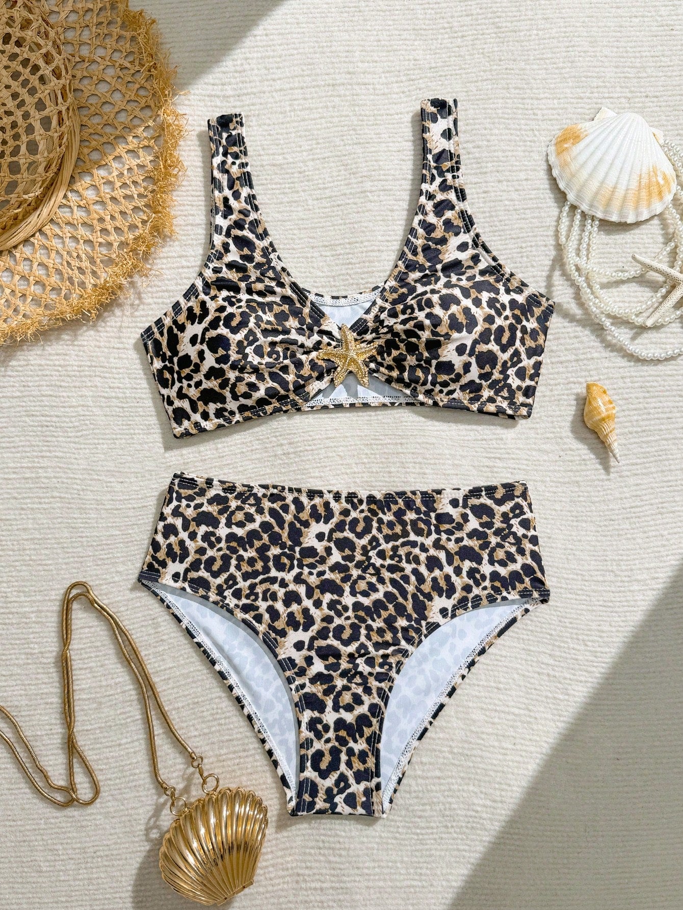 Tween girls 2-piece ditsy floral bikini set featuring a spaghetti strap top with center string detail and matching bottoms with side strings, designed for swimming, vacation, and summer wear.