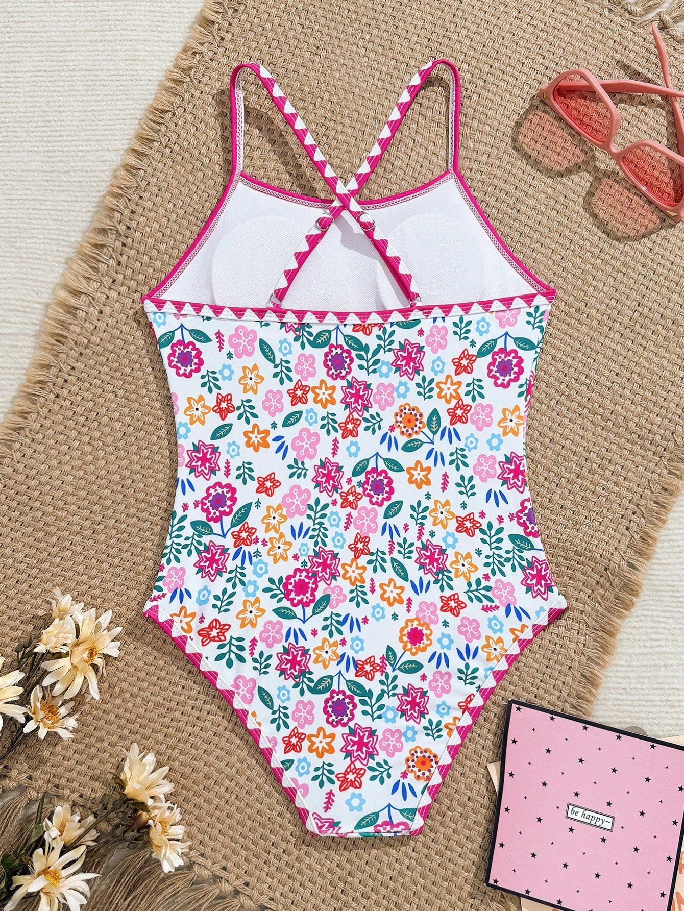 Tween girl one-piece swimsuit with floral plant print, asymmetrical neckline, cut-out detail, and fitted high-stretch design for beach and pool wear