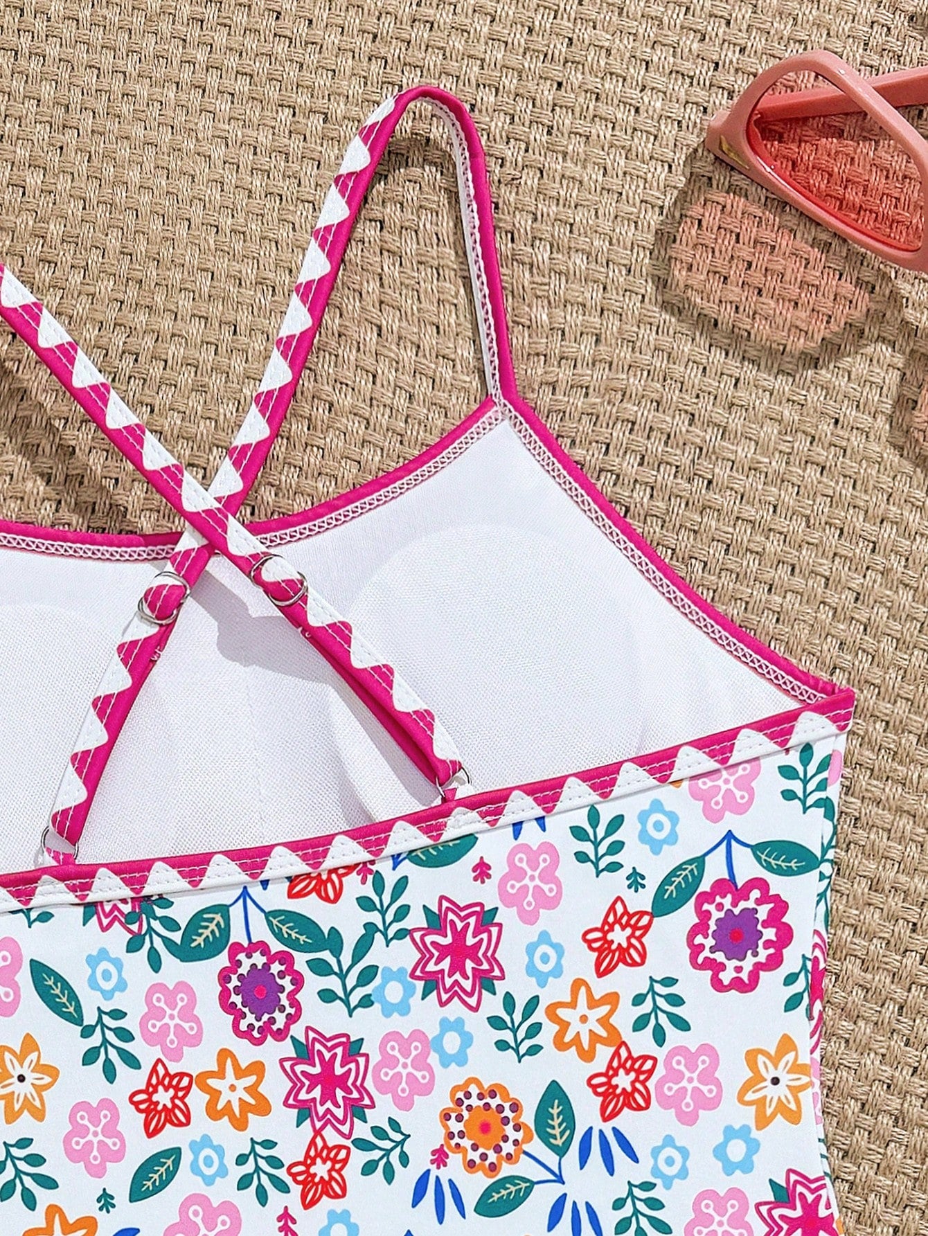 Tween girl one-piece swimsuit with floral plant print, asymmetrical neckline, cut-out detail, and fitted high-stretch design for beach and pool wear