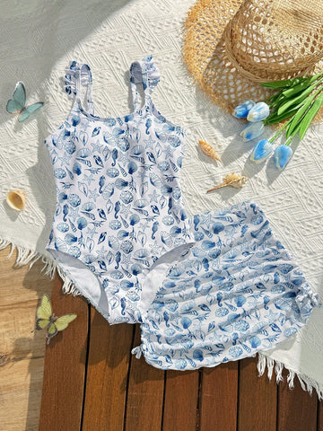 Tween girls multicolor one piece swimsuit set with spaghetti straps, ruffle detail, animal marine life print, and matching mesh cover skirt for summer vacation swimwear.