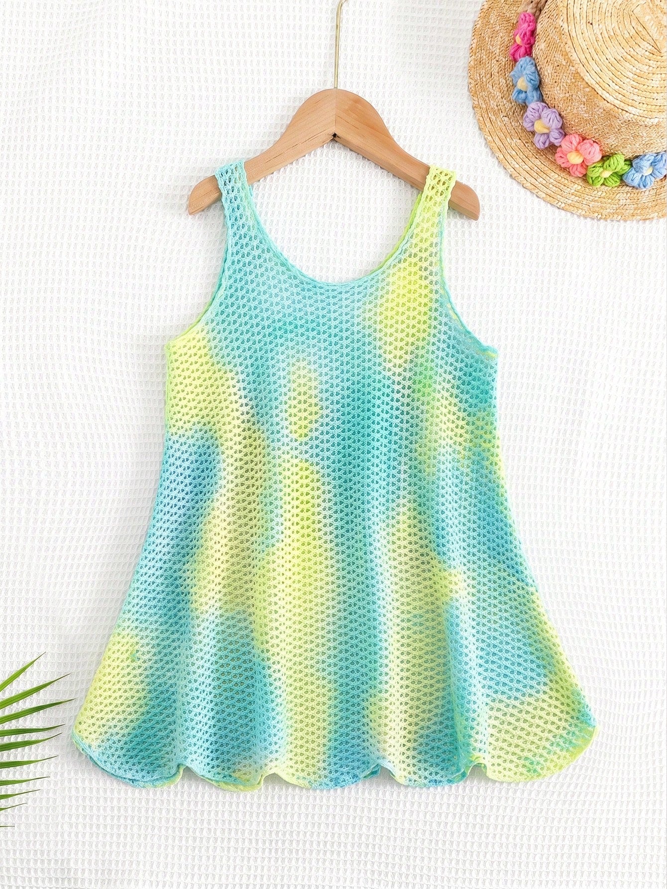 Multicolor hollow out geometric sleeveless swimwear cover-up for girls featuring scoop neck design.