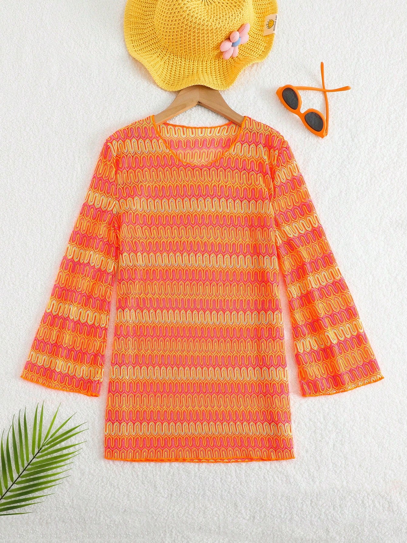 Orange long sleeve mesh swimwear cover up for tween girls with a round neck and short length