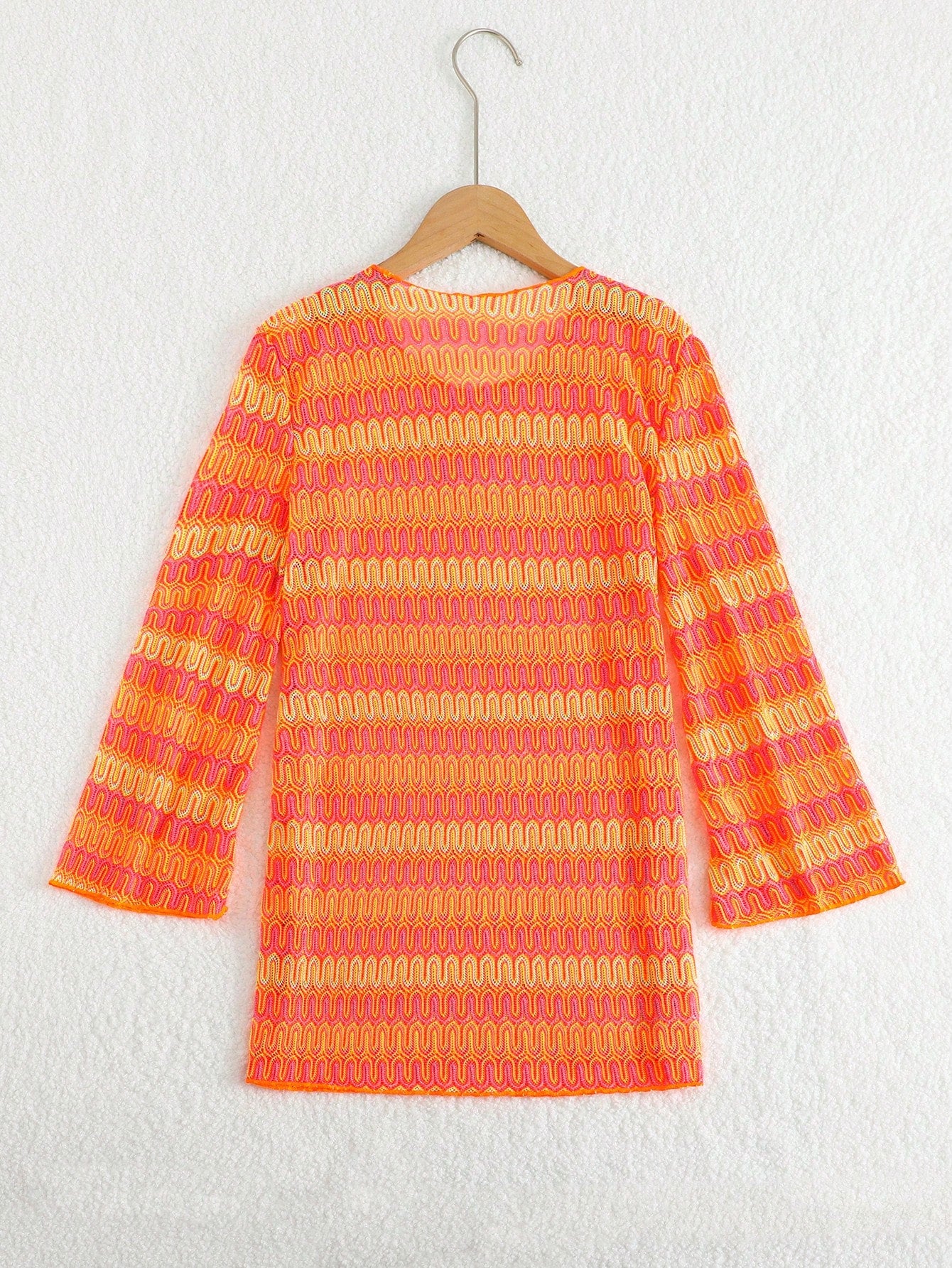 Orange long sleeve mesh swimwear cover up for tween girls with a round neck and short length