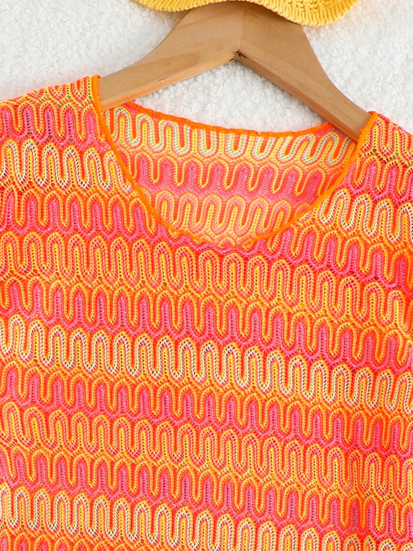 Orange long sleeve mesh swimwear cover up for tween girls with a round neck and short length