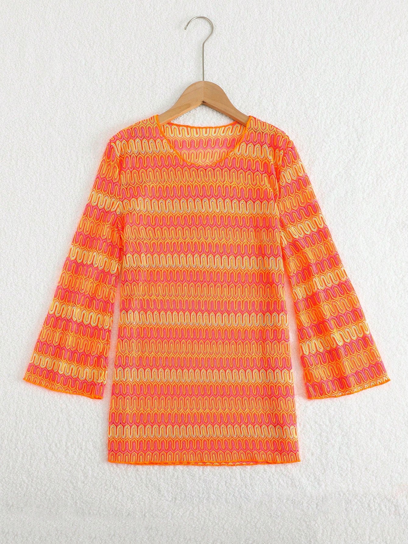 Orange long sleeve mesh swimwear cover up for tween girls with a round neck and short length