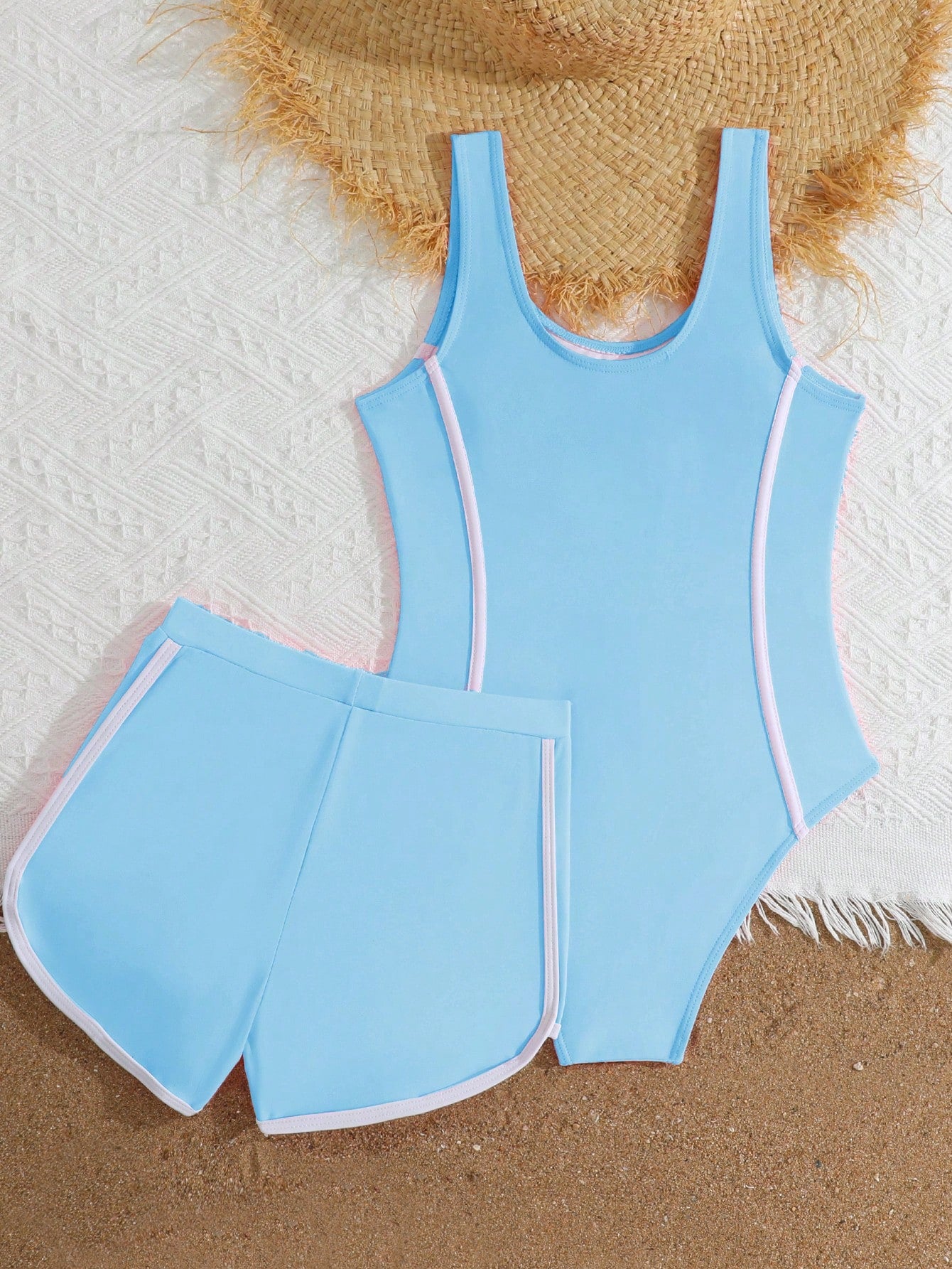 Girls baby blue striped 2-piece swimsuit set with sleeveless scoop neck one-piece, contrast piping, and matching swim shorts for beach and pool wear.