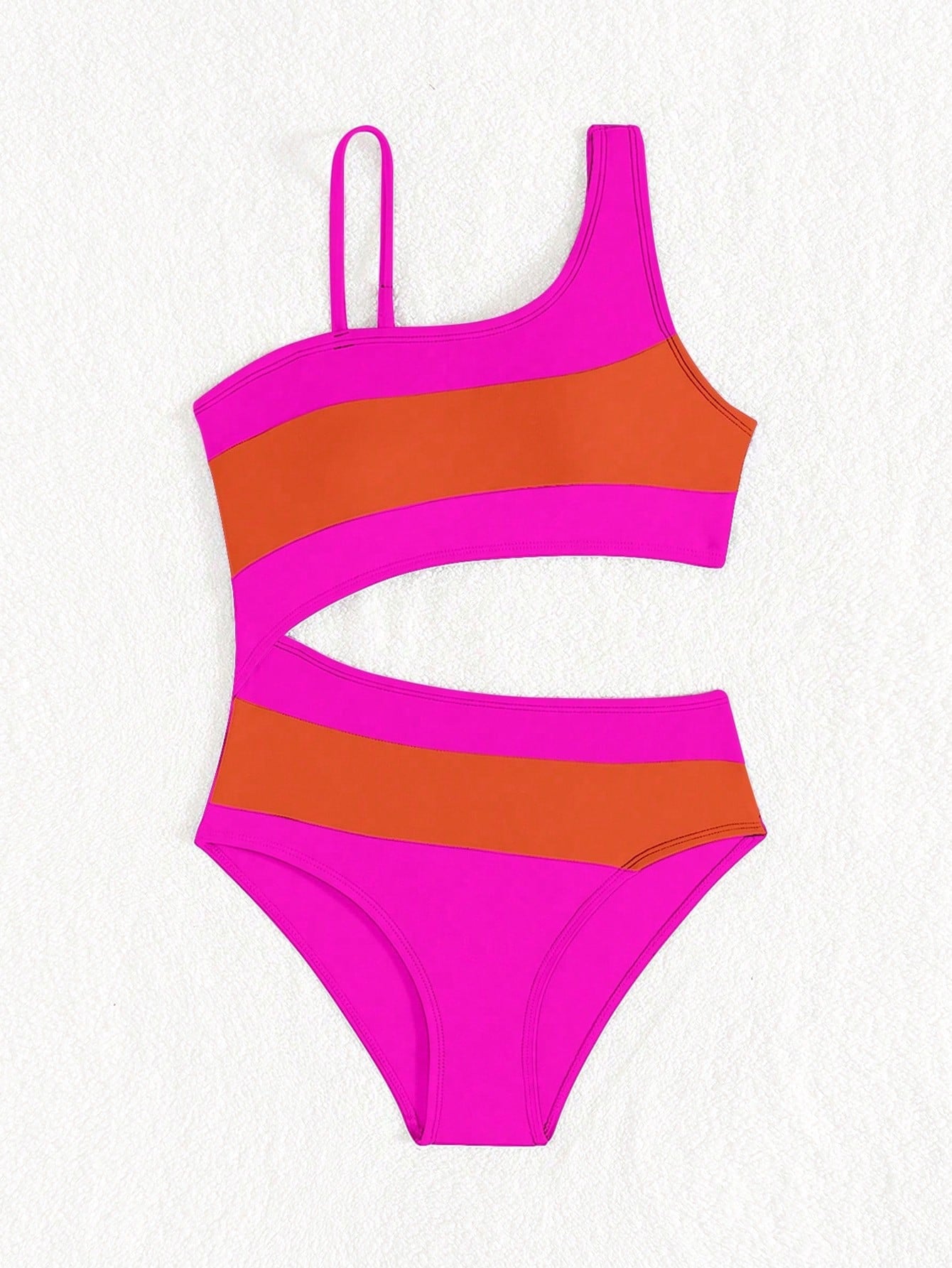 Black one-piece swimsuit for tween girls with cut out detail, spaghetti straps, high waist bottom, wireless bra, and fitted vacation swimwear style.
