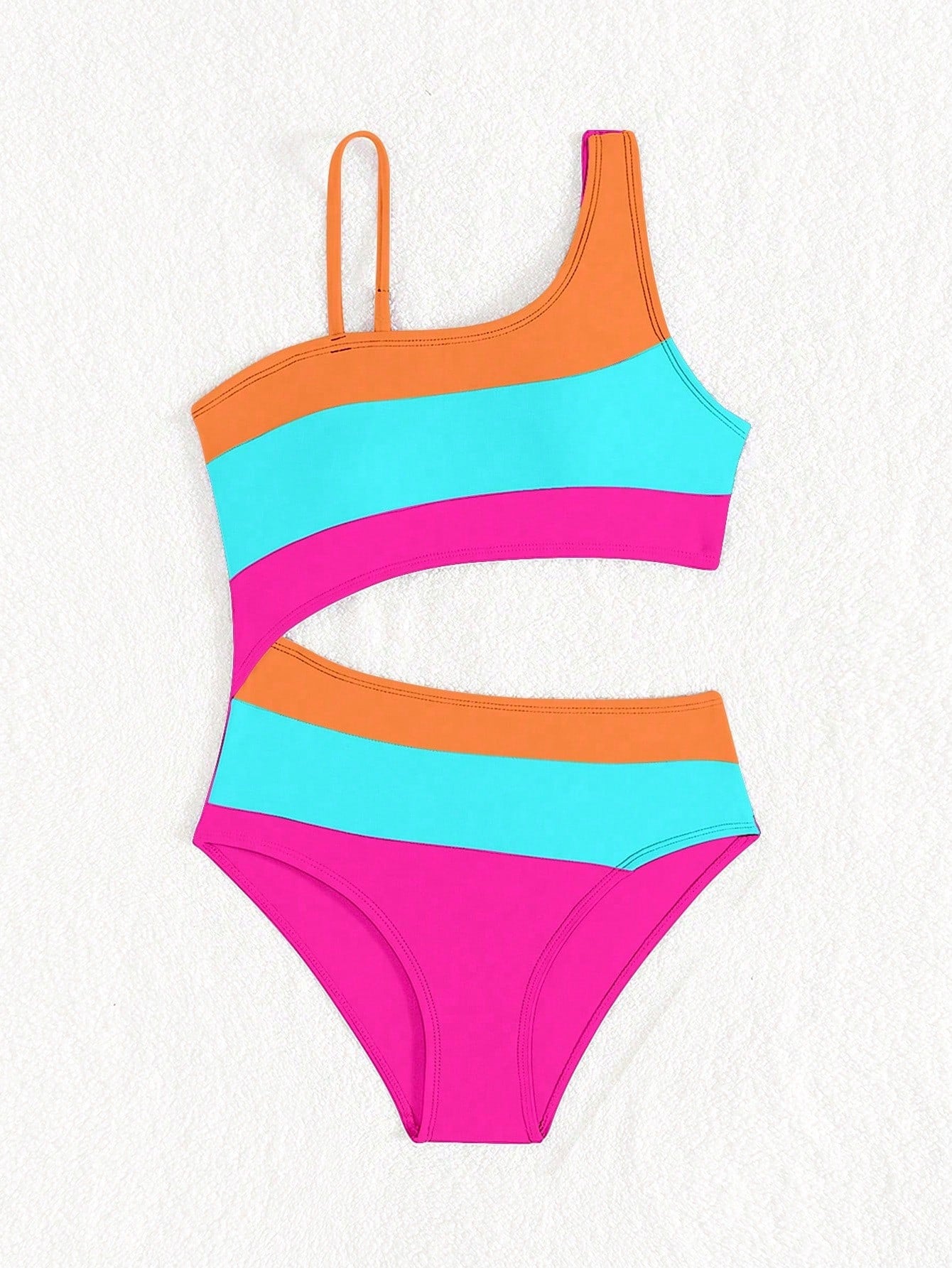Black one-piece swimsuit for tween girls with cut out detail, spaghetti straps, high waist bottom, wireless bra, and fitted vacation swimwear style.