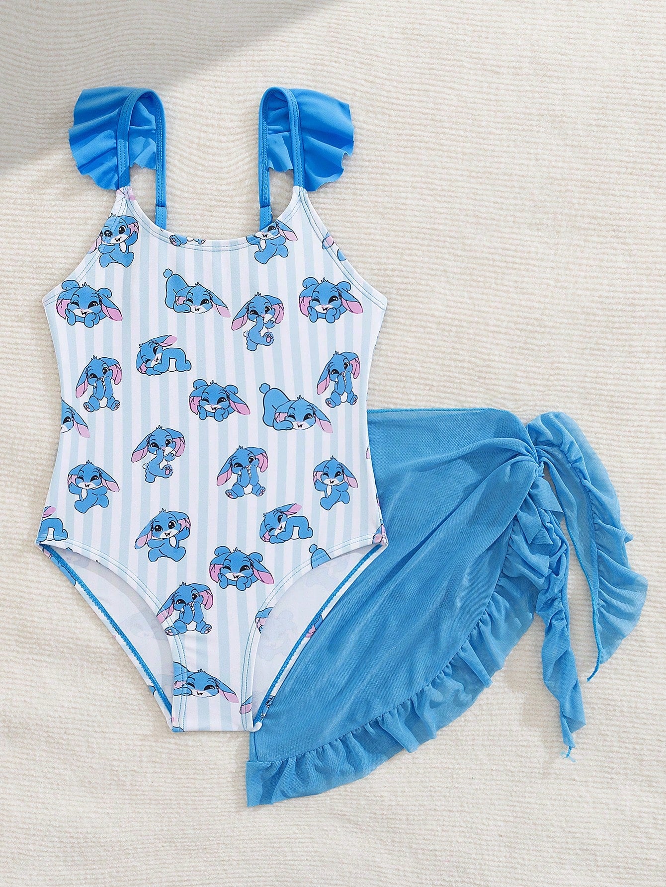 Tween girls one-piece swimsuit in leopard print with ruffle shoulder straps, scoop neckline, fitted shape, and attached ruffle hem skirt; sleeveless, mid-waist skirt bottom, and lined body for swimming, vacation, and summer beach wear.