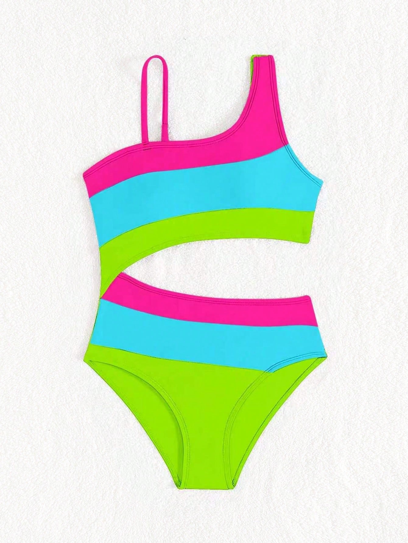 Black one-piece swimsuit for tween girls with cut out detail, spaghetti straps, high waist bottom, wireless bra, and fitted vacation swimwear style.