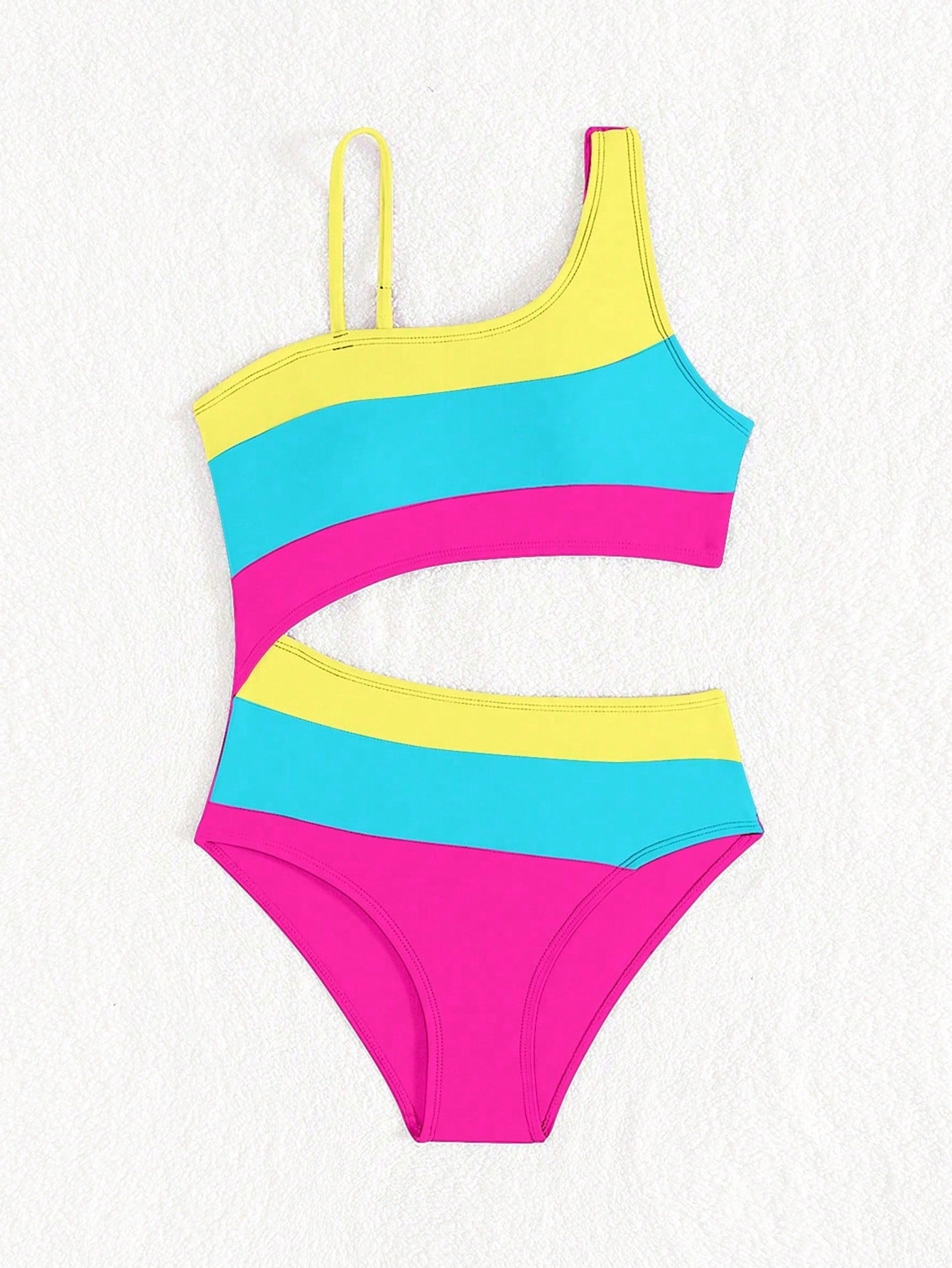 Black one-piece swimsuit for tween girls with cut out detail, spaghetti straps, high waist bottom, wireless bra, and fitted vacation swimwear style.