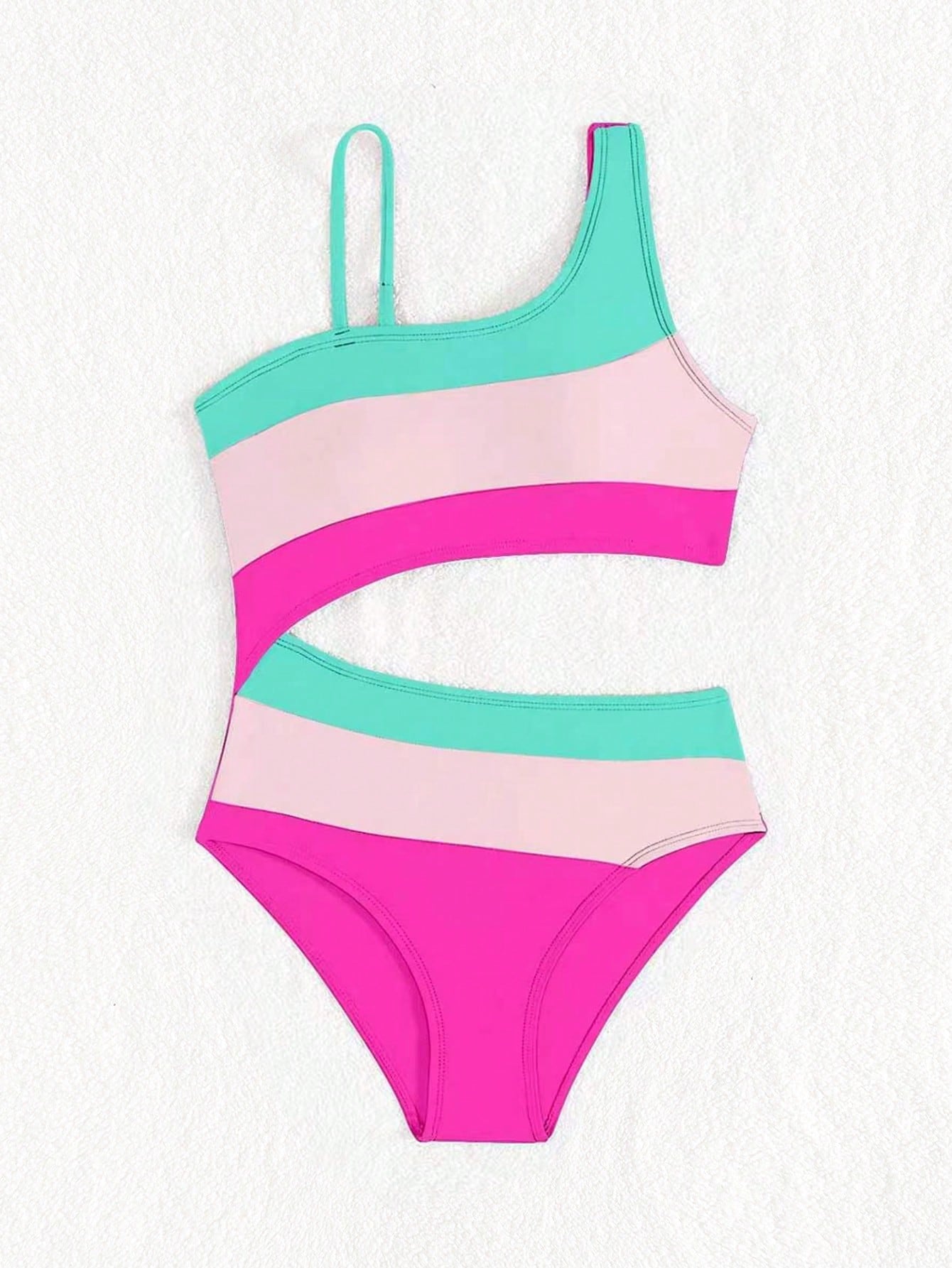 Black one-piece swimsuit for tween girls with cut out detail, spaghetti straps, high waist bottom, wireless bra, and fitted vacation swimwear style.