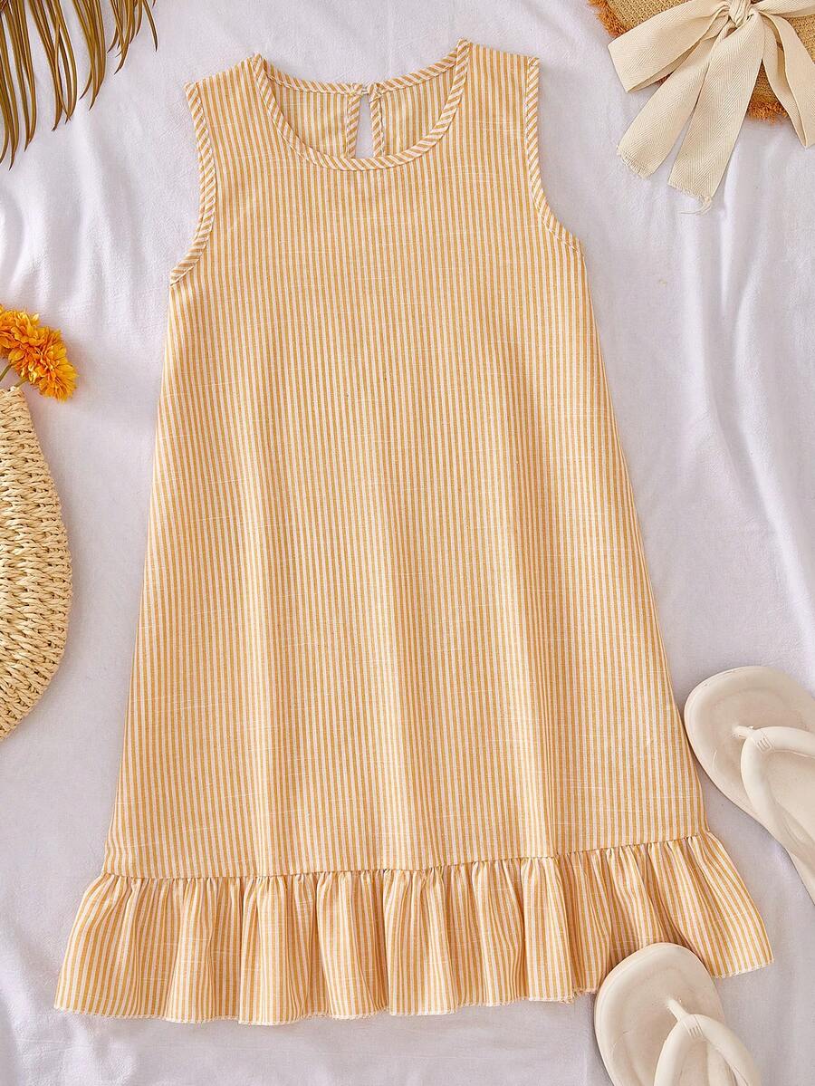 Tween girls casual leopard print smock mini dress featuring a round neck and flounce ruffle hem.