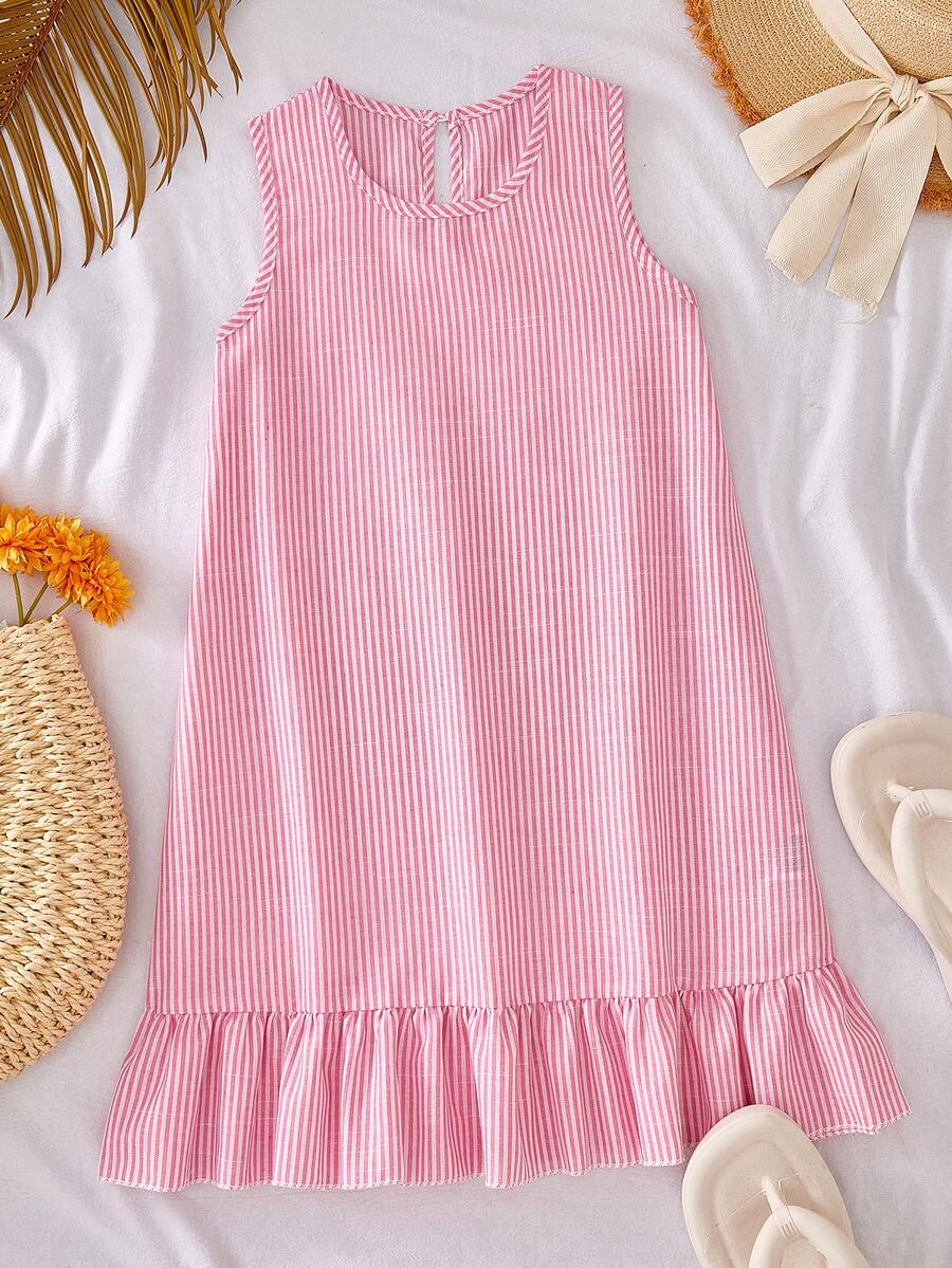 Tween girls casual leopard print smock mini dress featuring a round neck and flounce ruffle hem.