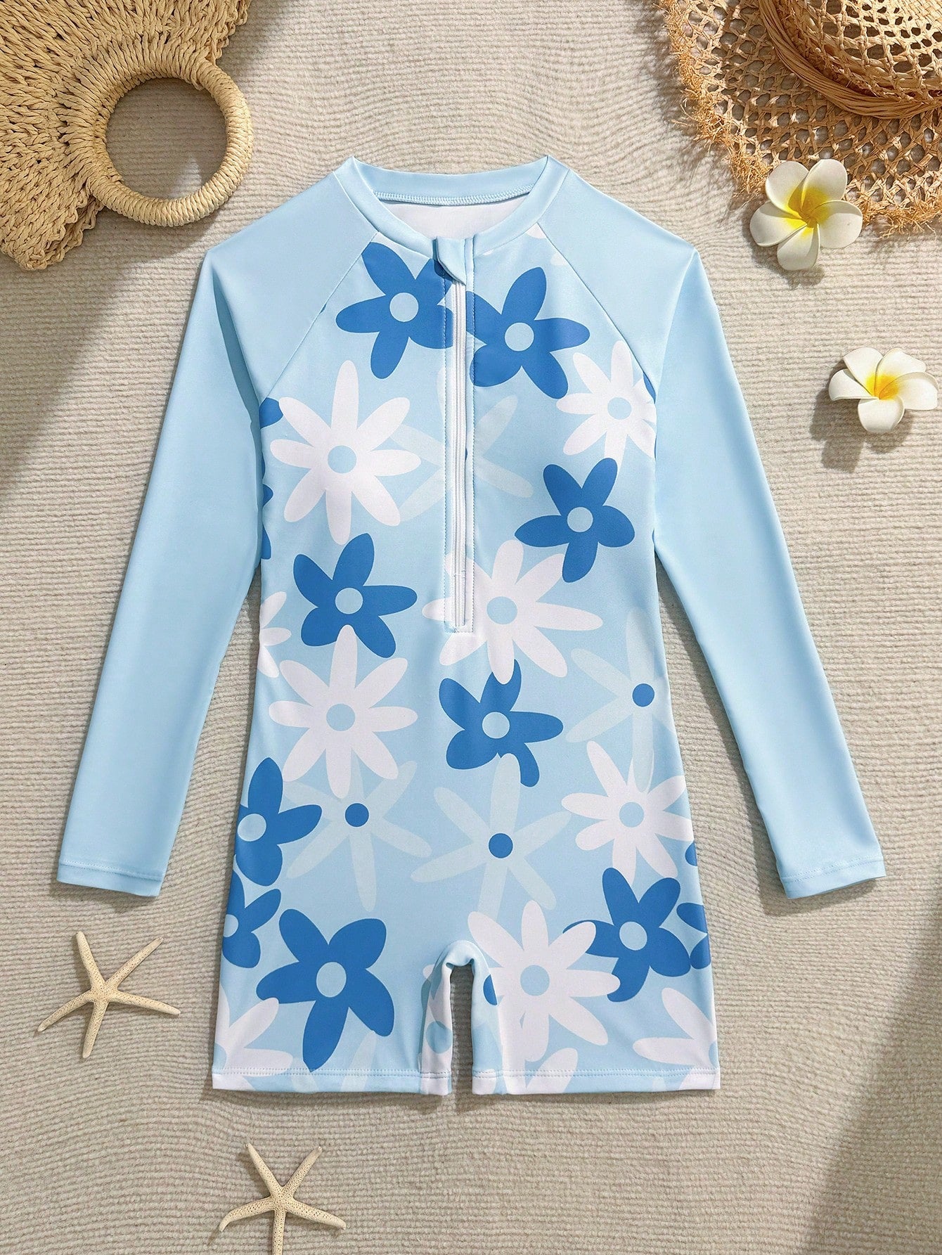 Tween girls one-piece swimsuit featuring a high neck, long sleeves, and shorts bottom, with a back zipper and strawberry plaid digital print on stretch knit fabric. Designed for swimming, vacation, and summer wear.