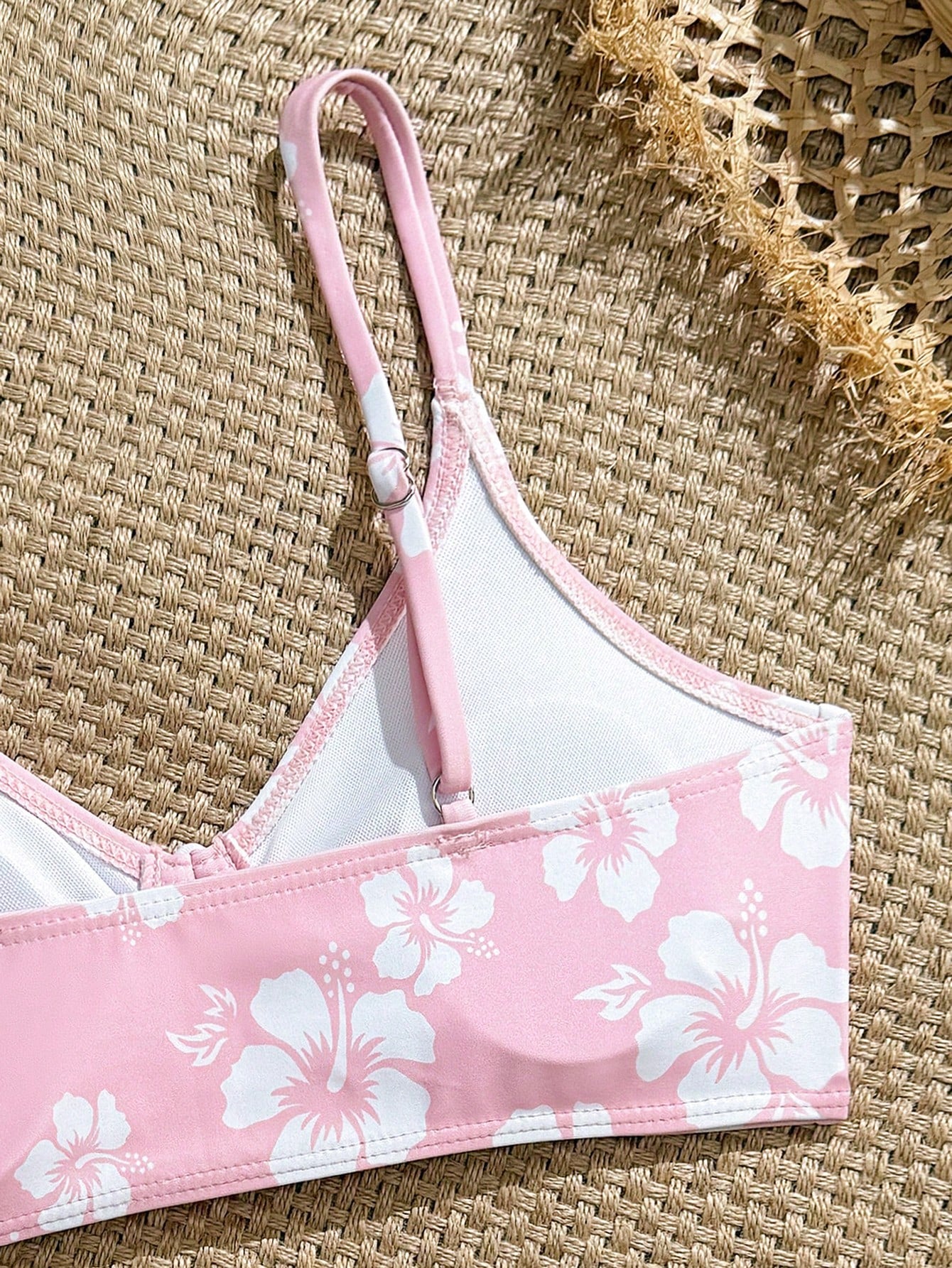 Tween girls 2-piece ditsy floral bikini set featuring a spaghetti strap top with center string detail and matching bottoms with side strings, designed for swimming, vacation, and summer wear.