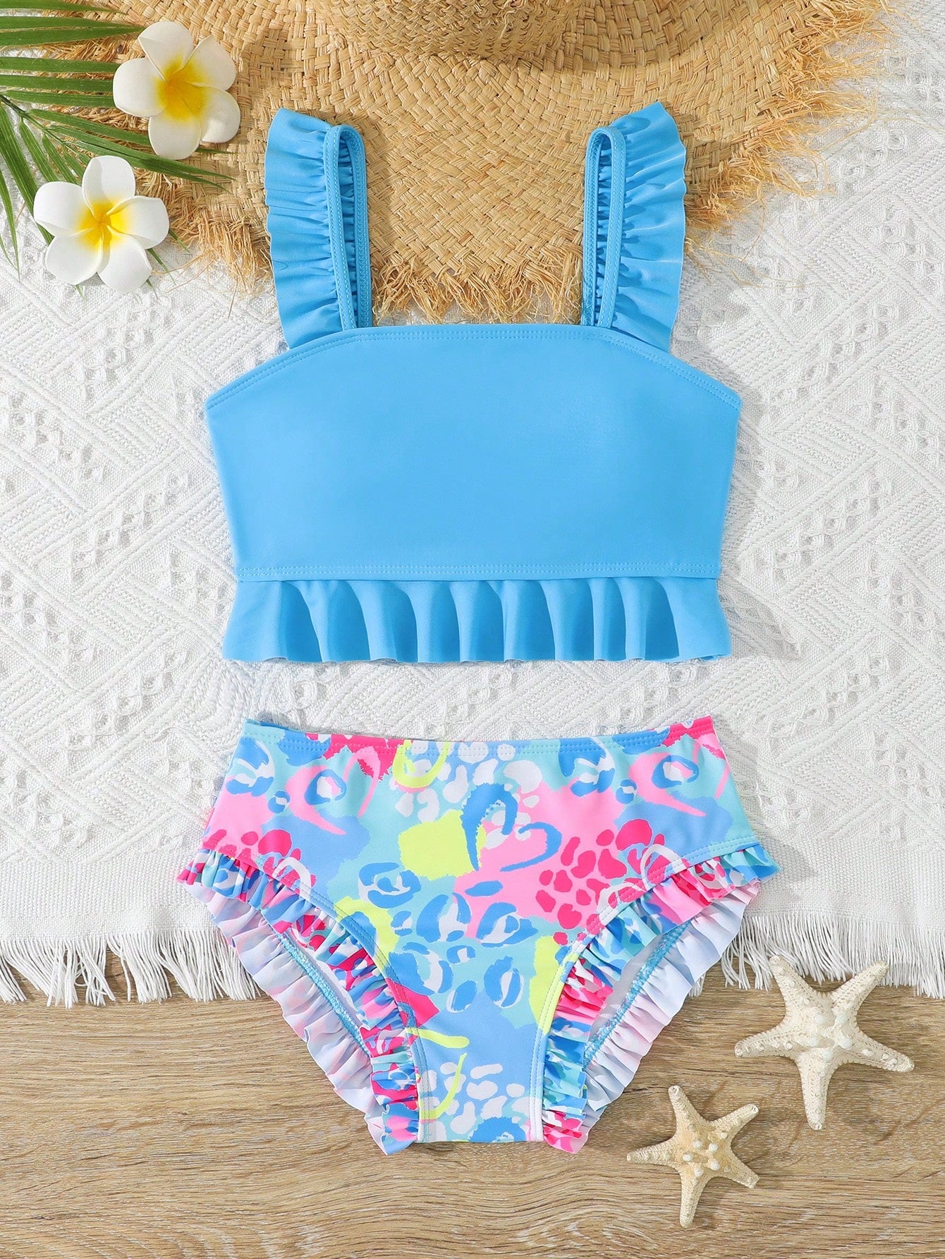 Tween girls solid color 2-piece bikini swimwear set with ruffle detail, strap neckline, wireless bikini top, and triangle mid-waist bikini bottoms; textured pattern with lined bottoms and high-stretch fabric, suitable for summer vacation.