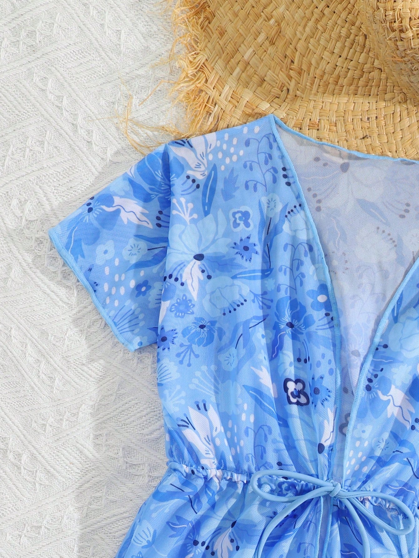 Three-piece tween girls swimwear set with a floral print, featuring a criss-cross bikini top, regular bikini bottoms, and a kimono cover-up in assorted prints.