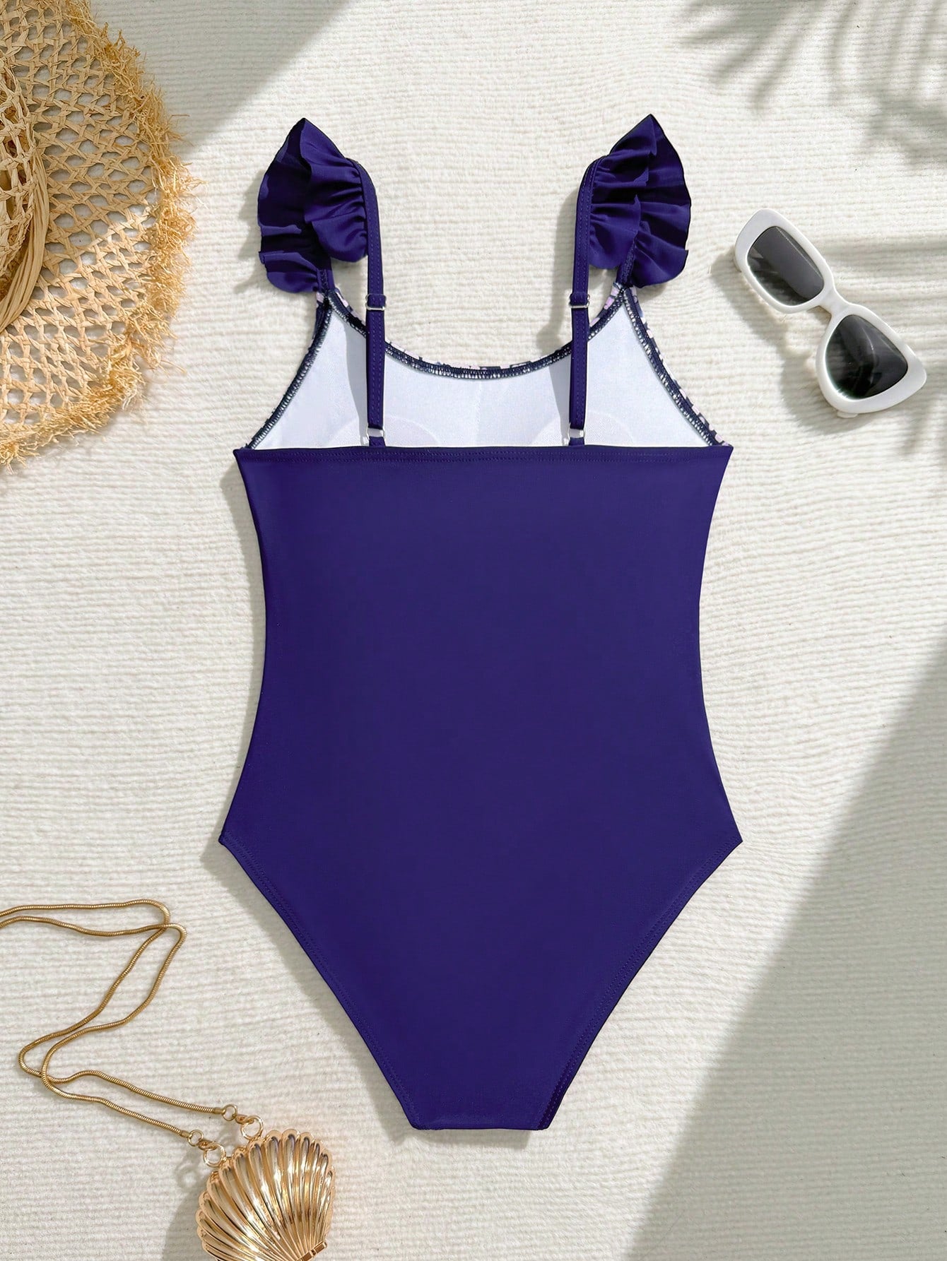 Tween girl one-piece swimsuit with floral plant print, asymmetrical neckline, cut-out detail, and fitted high-stretch design for beach and pool wear