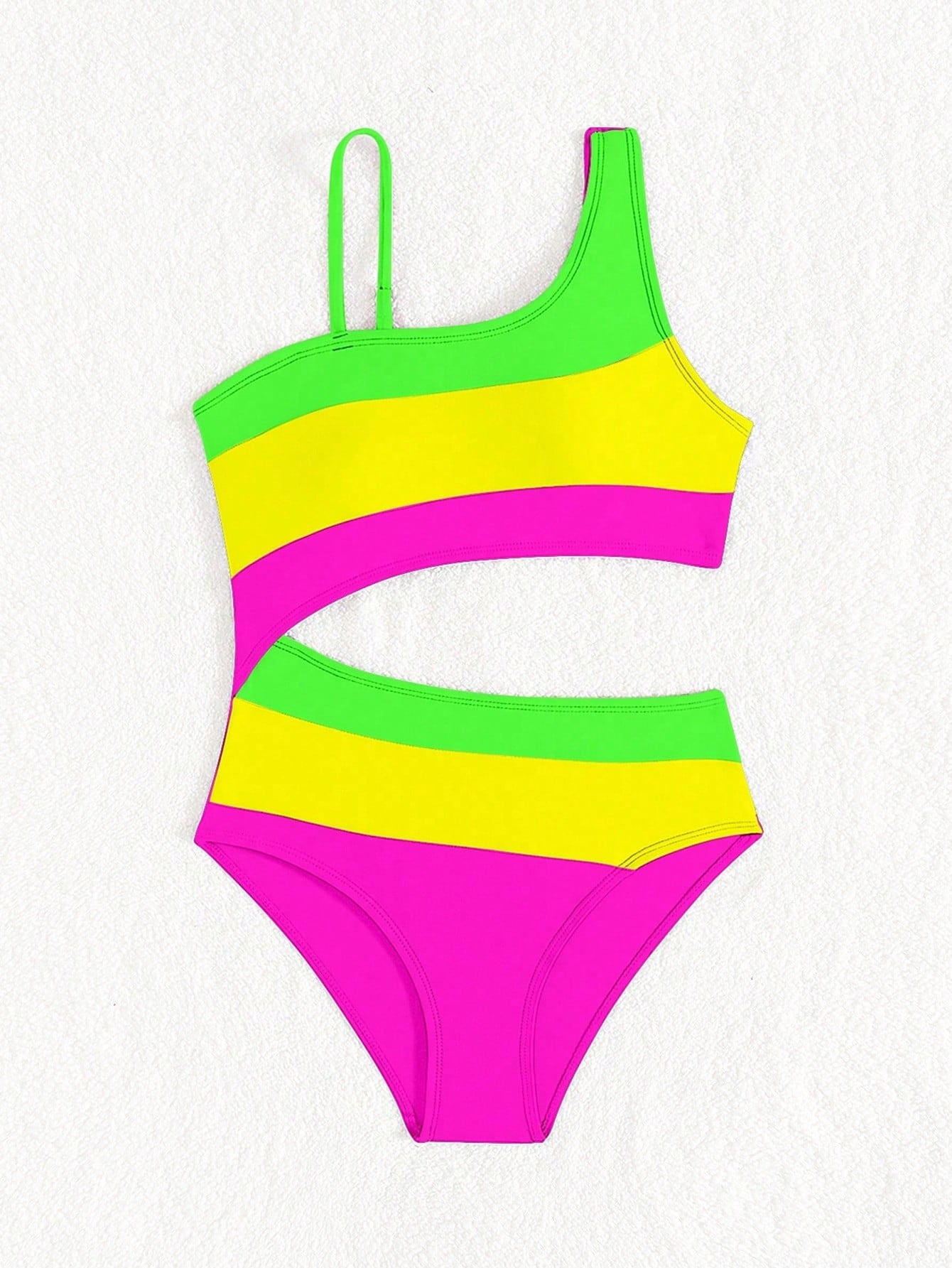 Black one-piece swimsuit for tween girls with cut out detail, spaghetti straps, high waist bottom, wireless bra, and fitted vacation swimwear style.