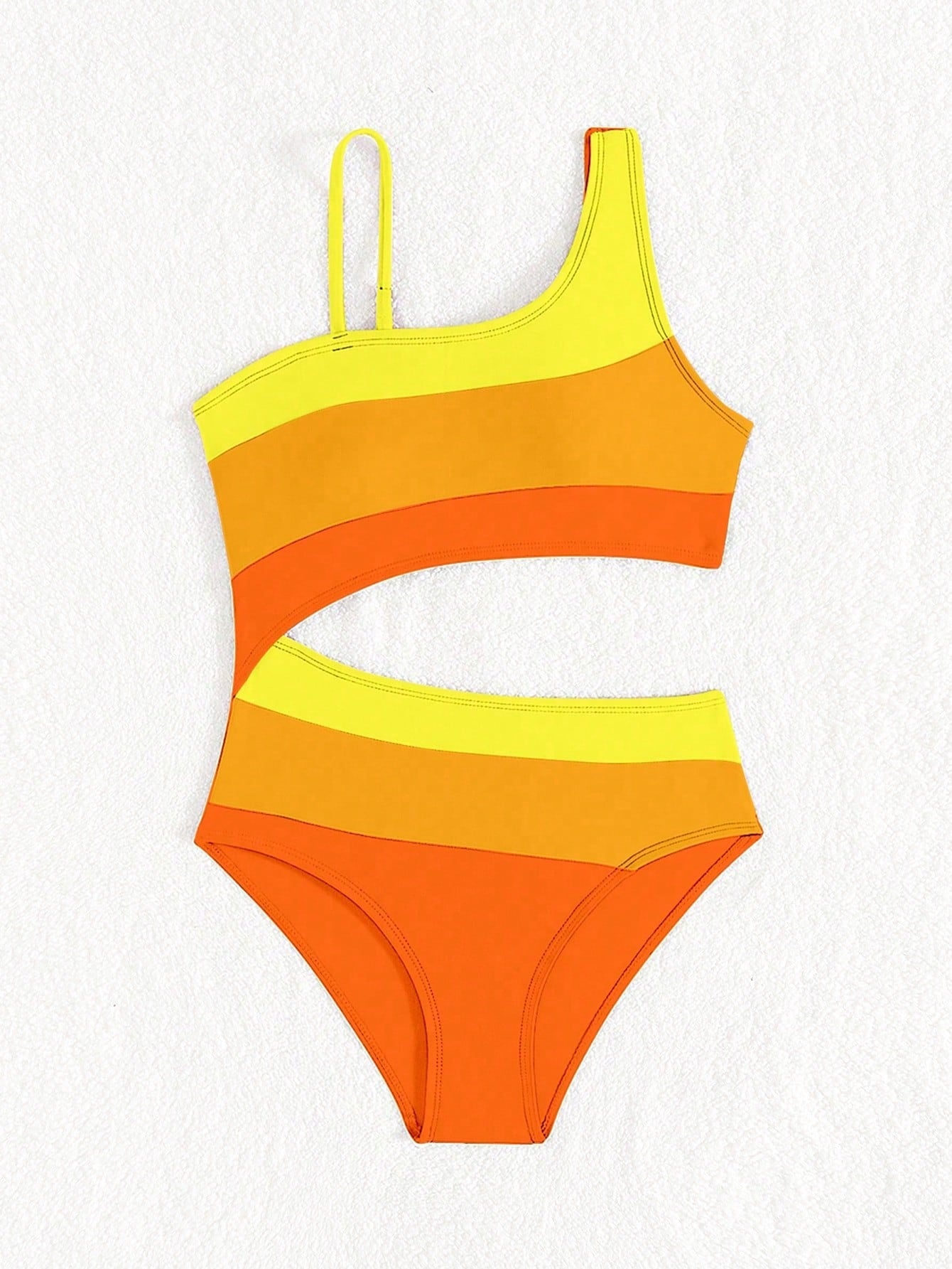 Black one-piece swimsuit for tween girls with cut out detail, spaghetti straps, high waist bottom, wireless bra, and fitted vacation swimwear style.