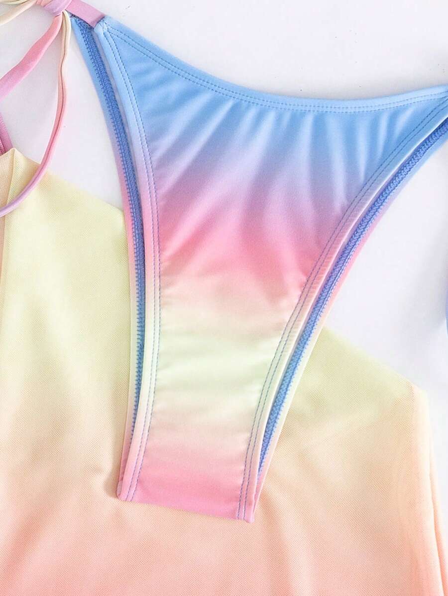 Women's 3-piece gradient bikini set featuring a green halter tie top with removable padding, low waist bottoms, and a matching sheer mesh skirt.