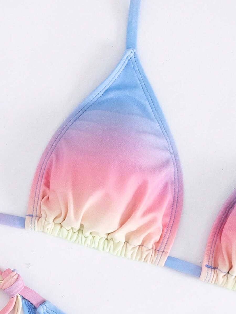 Women's 3-piece gradient bikini set featuring a green halter tie top with removable padding, low waist bottoms, and a matching sheer mesh skirt.
