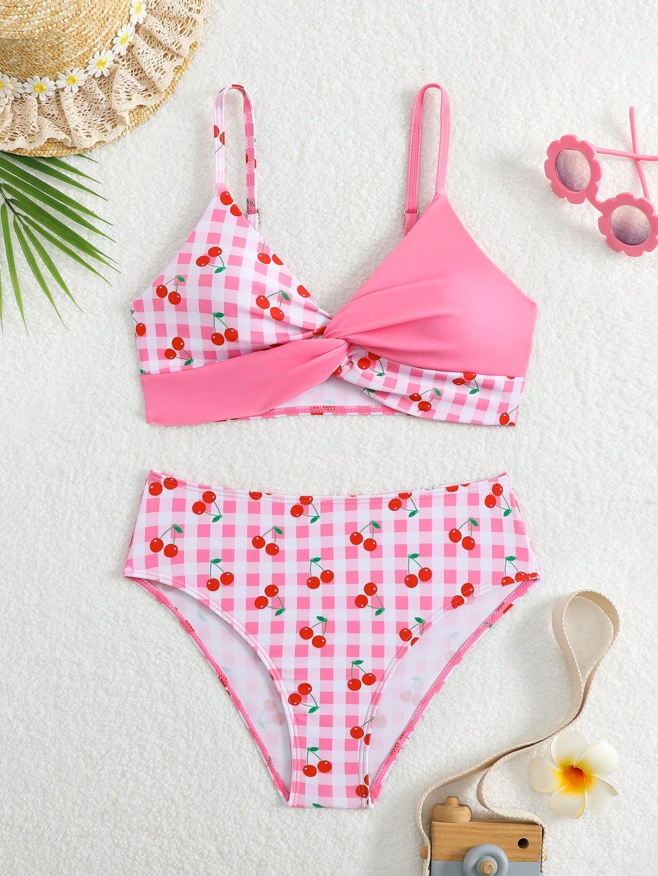 Tween girls multicolor striped 2-piece bikini set with spaghetti strap top, twist detail, and short high-waist or mid-waist swim bottoms for beach and pool wear.