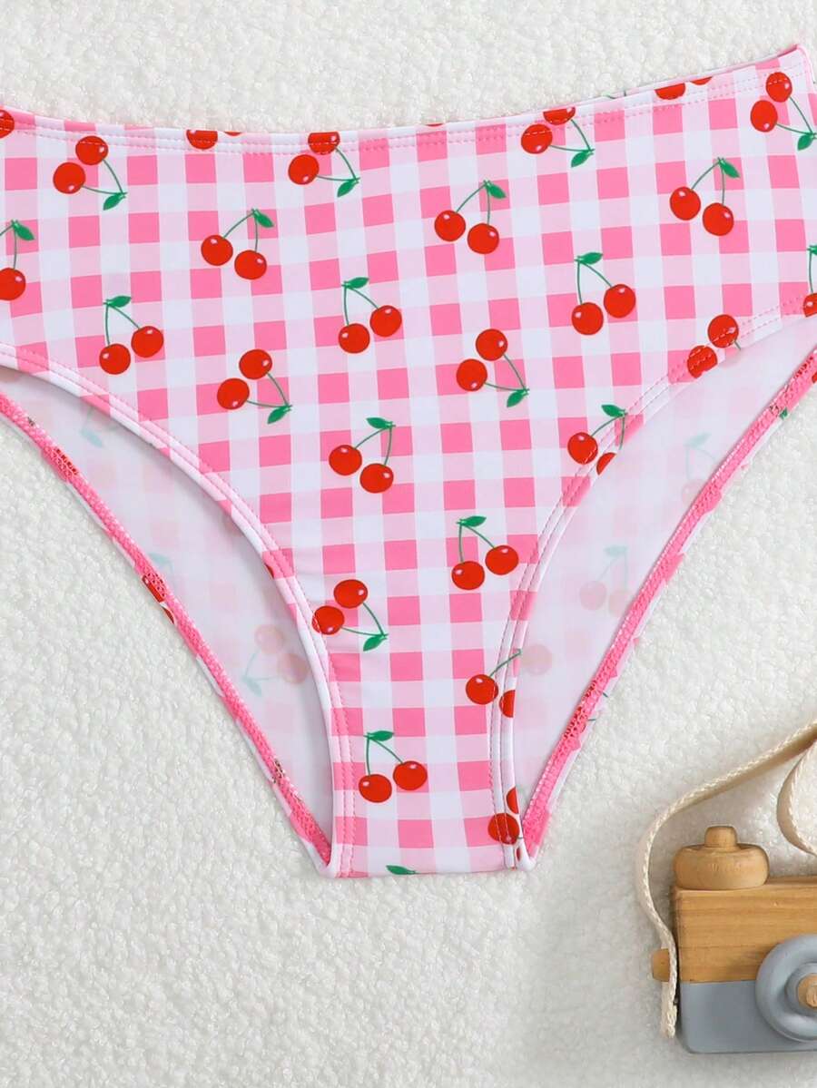 Tween girls multicolor striped 2-piece bikini set with spaghetti strap top, twist detail, and short high-waist or mid-waist swim bottoms for beach and pool wear.