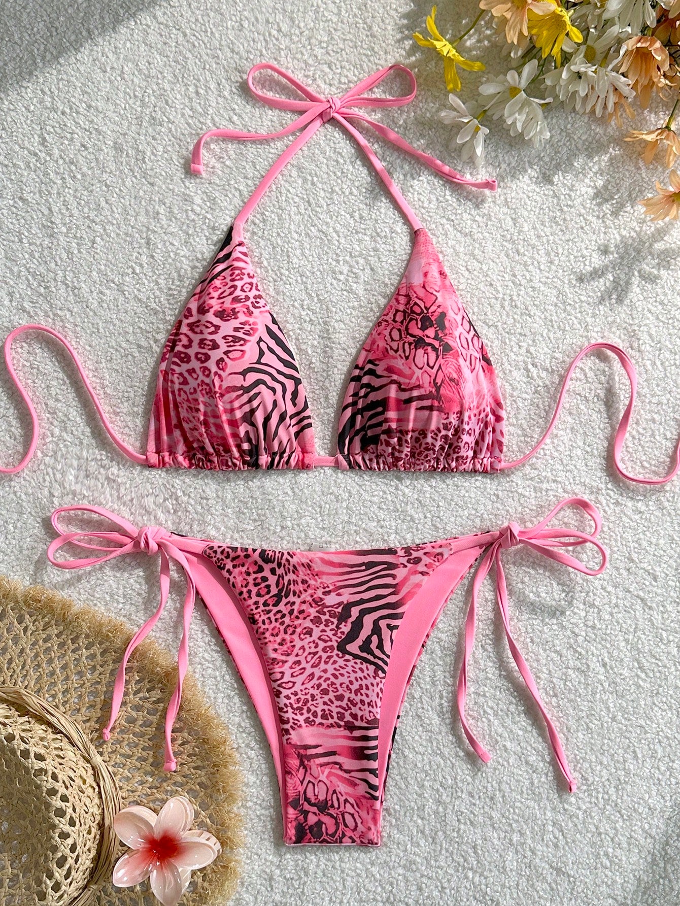Women's vintage leopard print 2-piece bikini set featuring a high waist tie-side bottom and a halter neck triangle top.