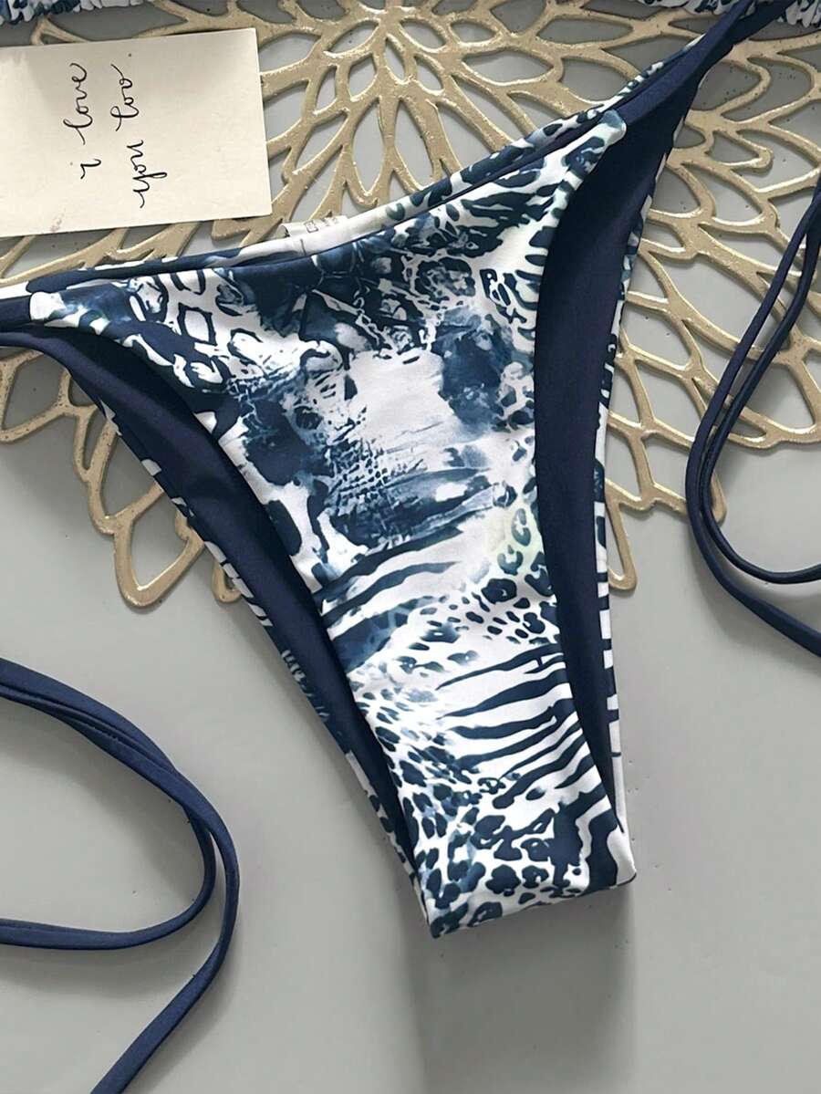 Women's vintage leopard print 2-piece bikini set featuring a high waist tie-side bottom and a halter neck triangle top.