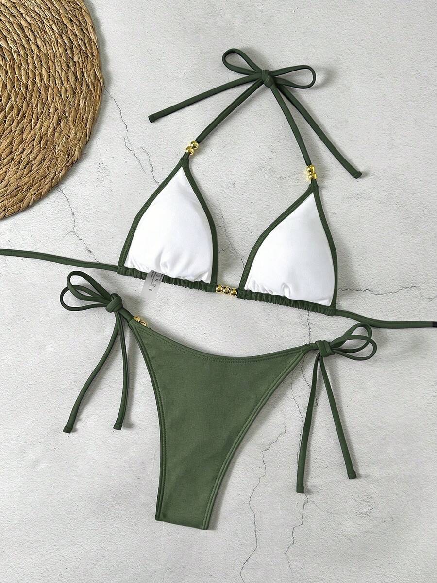 Women's black halter bikini set featuring triangle cups with gold bead decor and tie-back closure