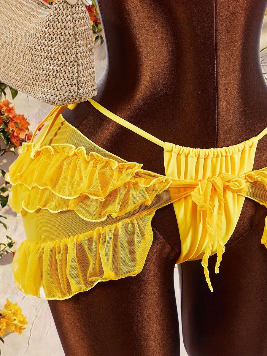 Women's 3-piece blue bikini swimwear set featuring a crop top with 3D rose accents, tie back detail, spaghetti straps, and tie-side bottoms.